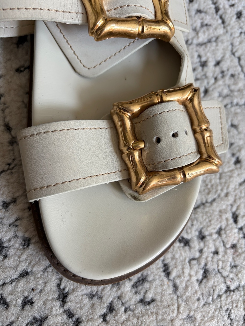 Women’s Schutz Enola White Slide Sandals with Decorative Gold Buckles - Picture 3 of 5